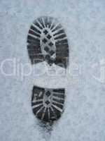 trace of shoe on a snow