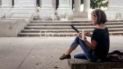 Education and students, portrait of happy young woman smiling at camera while drawing for art school