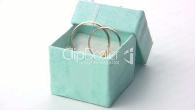 Wedding rings in a green box