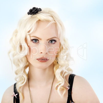 Portrait of a blond woman with curly hair