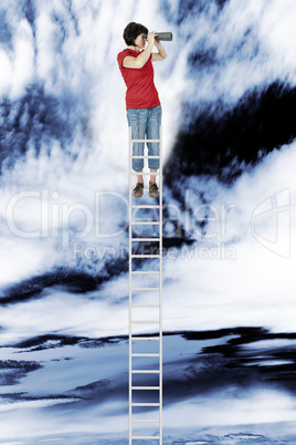 Woman standing on the ladder and looking into the distance with binoculars