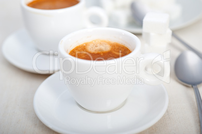 Italian espresso coffee and sugar cubes