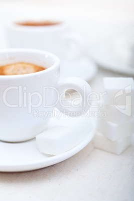 Italian espresso coffee and sugar cubes