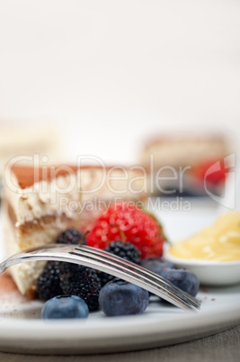 tiramisu dessert with berries and cream