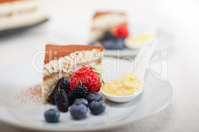 tiramisu dessert with berries and cream