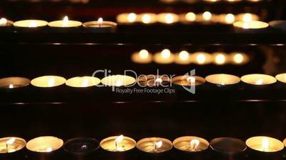 Burning candles in the St. Stephan cathedral, Vienna, Austria