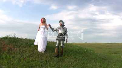 Knight and bride coming down the hill