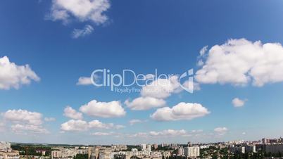 Quick clouds over the city. Timelapse