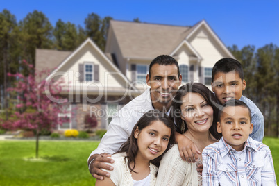 Hispanic Family in Front of Beautiful House