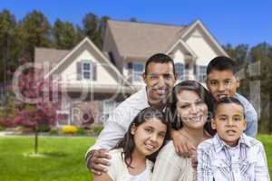 Hispanic Family in Front of Beautiful House