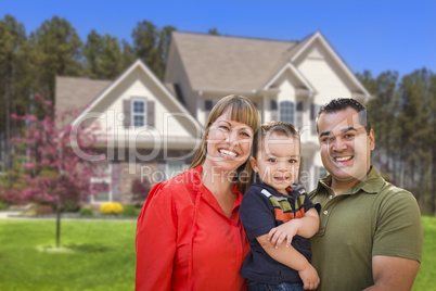 Mixed Race Young Family in Front of House