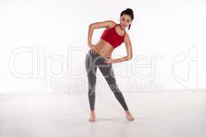 sporty woman doing stretching exercises