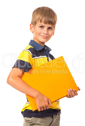 School boy is holding a book