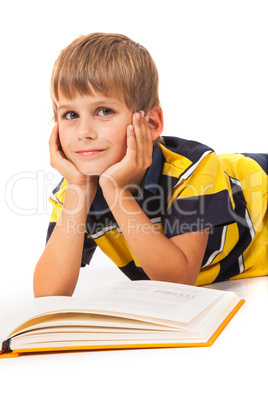 School boy is holding a book