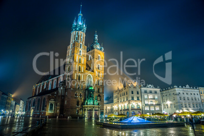 Poland, Krakow. Market Square at night.