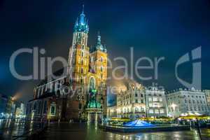 Poland, Krakow. Market Square at night.