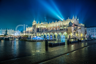 Poland, Krakow. Market Square at night.