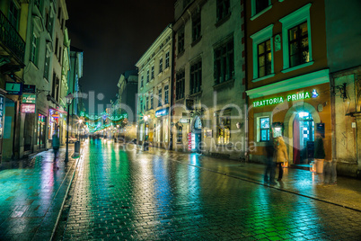Poland, Krakow. Market Square at night.