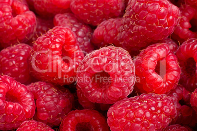 Ripe rasberry fruit horizontal close up background.