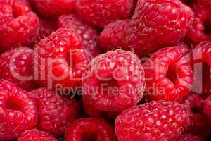 Ripe rasberry fruit horizontal close up background.
