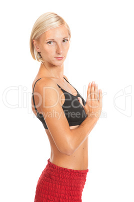 Practicing Yoga. Young woman isolated on white background