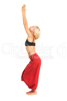 Practicing Yoga. Young woman isolated on white background