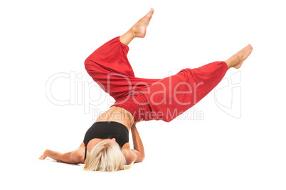 Practicing Yoga. Young woman isolated on white background