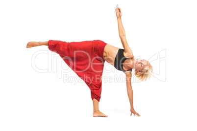 Practicing Yoga. Young woman isolated on white background