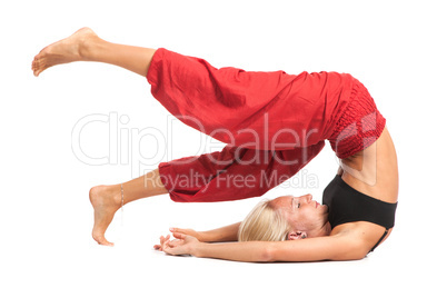 Practicing Yoga. Young woman isolated on white background