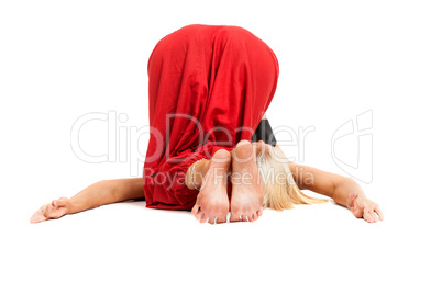 Practicing Yoga. Young woman isolated on white background