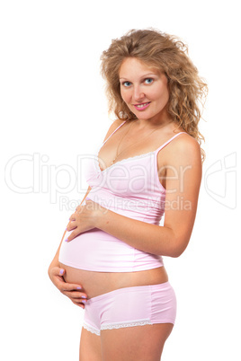 Pregnant woman is caressing her belly