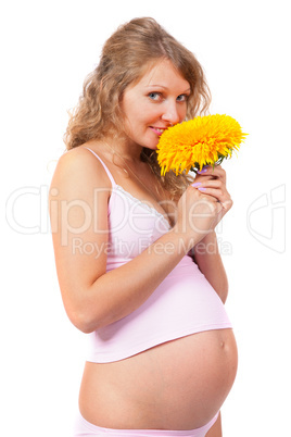 Pregnant woman is caressing her belly