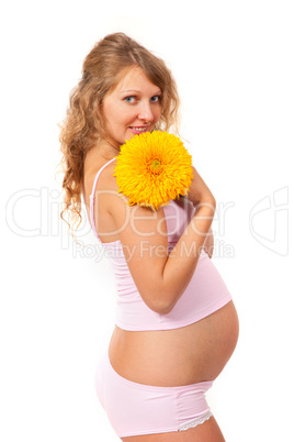 Pregnant woman is caressing her belly