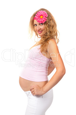 Pregnant woman is caressing her belly