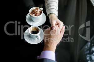 Concept of male and female hands, love and coffee