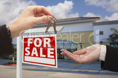 Agent Handing Over the Keys in Front of Business Office