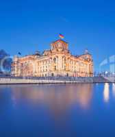 The Reichstag building (Bundestag), famous landmark in Berlin  and housing the German Government  with spree reflection