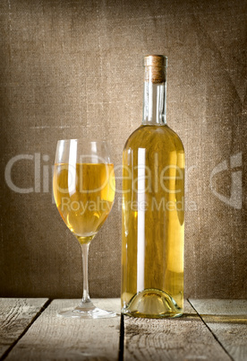 Dessert wine and glass on the canvas