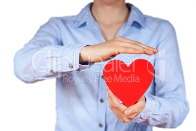 person holding a heart