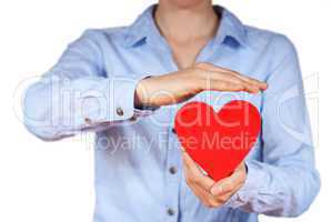 person holding a heart