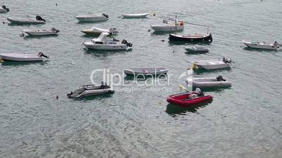 Small boats, motorboats and pontoons in port