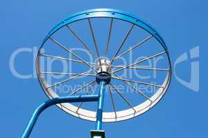 Metal detail as a bicycle wheel