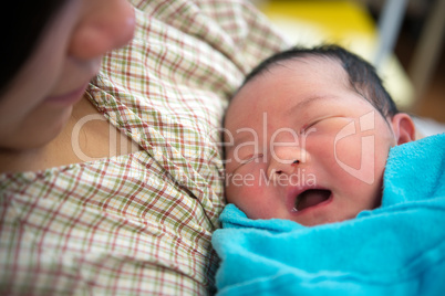 Asian mother and newborn baby