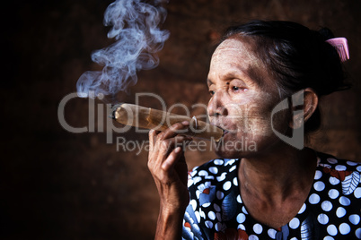 Old Asian woman smoking