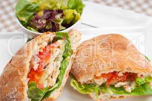 ciabatta panini sandwich with chicken and tomato