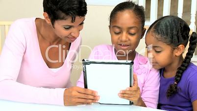 Young African American Girls with Wireless Tablet