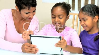 Young African American Girls with Wireless Tablet