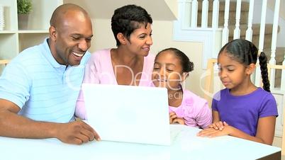 African American Family Using Online Web Chat