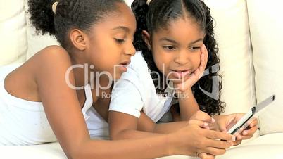 Little Girls with Wireless Tablet
