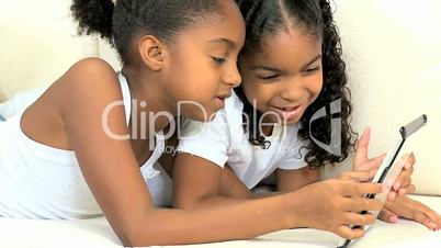 Ethnic Children with Modern Wireless Tablet